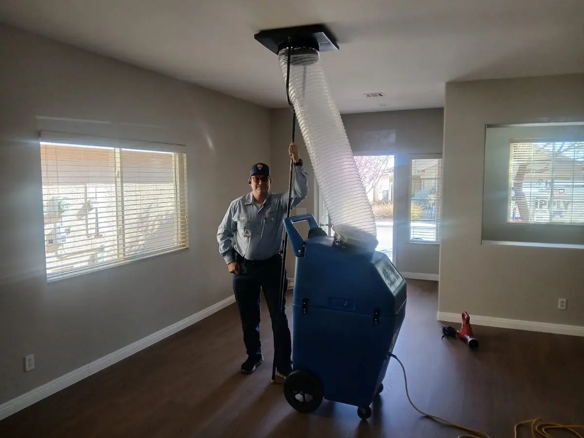 Professional Dryer Vent Cleaning work inside a Royal Palm Beach home